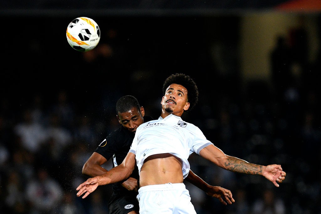 GUIMARAES, PORTUGAL - OCTOBER 03: Lucas Evangelista of Vitoria Guimaraes is challenged by Evan N'Dicka of Eintracht Frankfurt during the UEFA Europ...