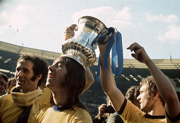 OTD: 3 Arsenal legends born 2 1971: Arsenal Football Club player Charlie George stands between George Graham and a fellow player who are holding the FA Cup on his head. (Photo by A. Jones/Express/Getty Images)