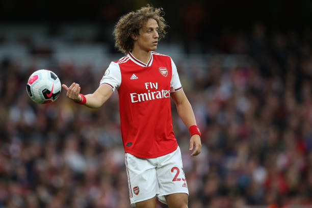 LONDON, ENGLAND - SEPTEMBER 22: David Luiz of Arsenal throws the ball during the Premier League match between Arsenal FC and Aston Villa at Emirate...