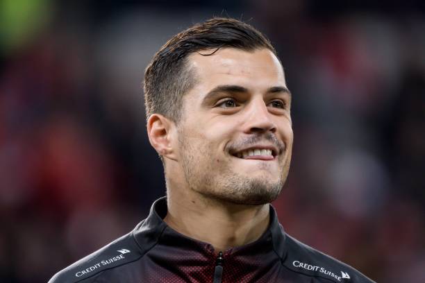 Switzerland's midfielder Granit Xhaka smiles prior to the Euro 2020 football qualification match between Switzerland and Ireland at the Stade de Ge...