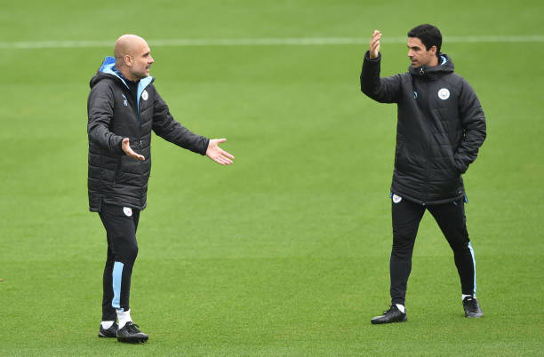 PSG 'warned' that Arsenal could move for Allegri but Arsenal have others on shortlist 6 MANCHESTER, ENGLAND - SEPTEMBER 30: Pep Guardiola of Manchester City talks to Mikel Arteta, Assistant Manager of Manchester City during a training session at Manchester City Football Academy on September 30, 2019 in Manchester, England. (Photo by Nathan Stirk/Getty Images)