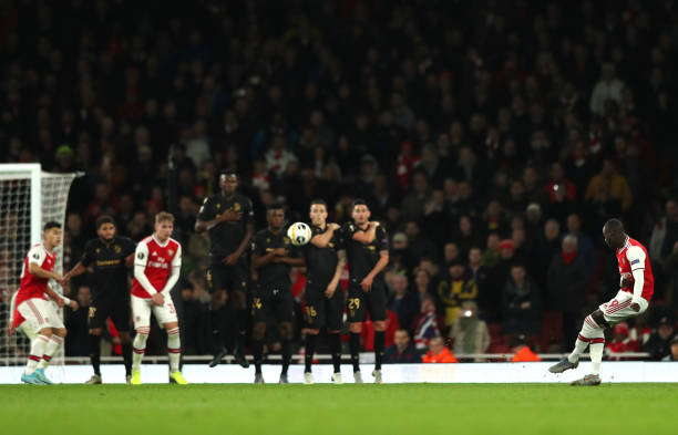 LONDON, ENGLAND - OCTOBER 24: Nicolas Pepe of Arsenal scores his team's second goal during the UEFA Europa League group F match between Arsenal FC ...