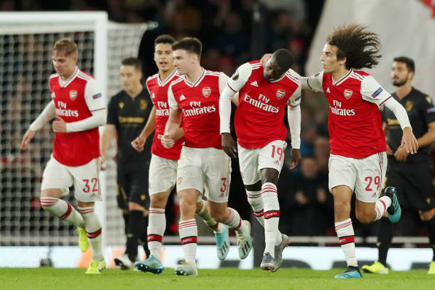 LONDON, ENGLAND - OCTOBER 24: Nicolas Pepe of Arsenal celebrates with team mates after scoring his team's second goal during the UEFA Europa League...