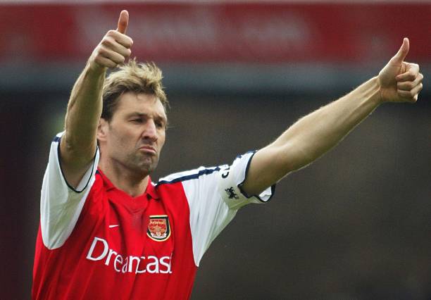 OTD: 3 Arsenal legends born 4 LONDON, UNITED KINGDOM: Arsenal's Captain Tony Adams salutes the crowd during the game against Sunderland in the Premier League match at Highbury in London 30 March 2002. Adams playing his 500th league game, captained his team to a 3-0 victory. AFP PHOTO Adrian DENNIS