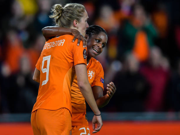 Netherlands' forward Vivianne Miedema (L) celebrates with Netherlands' defender Liza van der Most during the Women's UEFA Euro 2021 group stage qualification football match between Netherlands and Russia on October 8, 2019. (Photo by Gerrit VAN KEULEN / ANP / AFP) / Netherlands OUT (Photo by GERRIT VAN KEULEN/ANP/AFP via Getty Images)