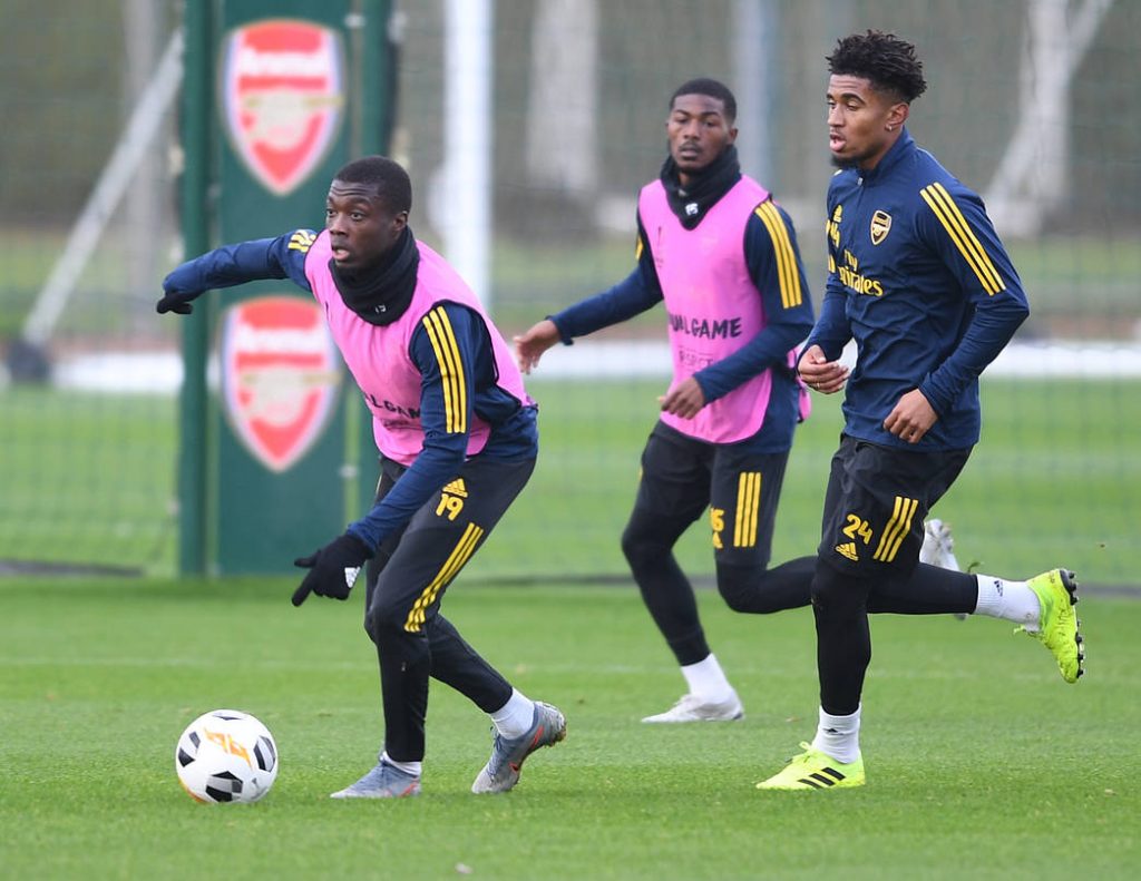 Emile Smith Rowe and Reiss Nelson return to first-team training after u23 starts 2 ST ALBANS, ENGLAND - NOVEMBER 05: Nicolas Pépé, Ainsley Maitland-Niles and Reiss Nelson of Arsenal during a training session at London Colney on November 05, 2019, in St Albans, England. (Photo by Stuart MacFarlane/Arsenal FC via Getty Images)