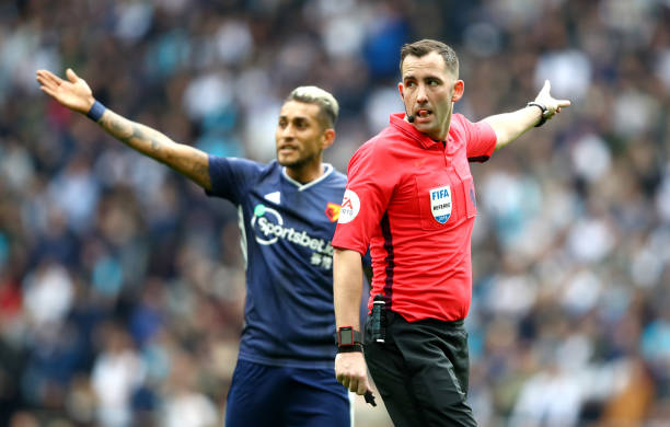 LONDON, ENGLAND - OCTOBER 19: Match referee Chris Kavanagh reacts during the Premier League match between Tottenham Hotspur and Watford FC at Tottenham Hotspur Stadium on October 19, 2019 in London, United Kingdom. (Photo by Julian Finney/Getty Images)