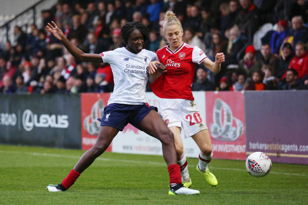 Arsenal stay 3rd with Liverpool win as title race hots up 4 BOREHAMWOOD, ENGLAND - NOVEMBER 24: Rinsola Babajide of Liverpool and Leonie Maier of Arsenal battle for the ball during the Barclays FA Women's Super League match between Arsenal and Liverpool at Meadow Park on November 24, 2019 in Borehamwood, United Kingdom. (Photo by Kate McShane/Getty Images)