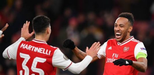 Arsenal's Gabonese striker Pierre-Emerick Aubameyang (R)bcelebrates scoring his team's first goal with Arsenal's Brazilian striker Gabriel Martinelli during their UEFA Europa league Group F football match between Arsenal and Eintracht Frankfurt at the Emirates stadium in London on November 28, 2019. (Photo by DANIEL LEAL-OLIVAS / AFP) (Photo by DANIEL LEAL-OLIVAS/AFP via Getty Images)