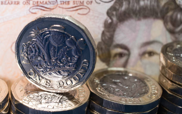 Arsenal fined £7m by UEFA for Super League nonsense 2 BATH, ENGLAND - APRIL 04: In this photo illustration the new £1 pound coin is seen on April 4, 2017 in Bath, England. Currency experts have warned that as the uncertainty surrounding Brexit continues, the value of the British pound, which has remained depressed against the US dollar and the euro since the UK voted to leave in the EU referendum, is likely to fluctuate. (Photo by Matt Cardy/Getty Images)