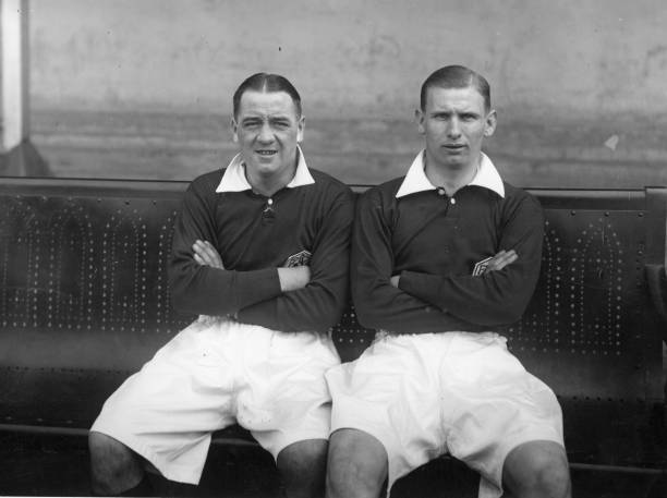 95 years ago: Arsenal's first FA Cup final win 4 Arsenal footballers Cliff Bastin (right), the most accomplished winger of his generation, and Alex James (left). Original Publication: People Disc - HD0439 (Photo by London Express/Getty Images)