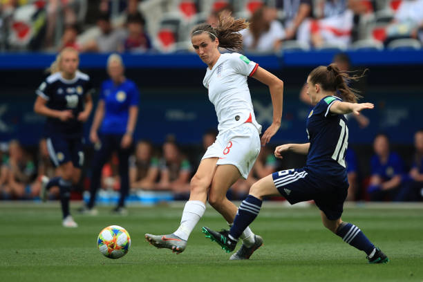 NICE, FRANCE - JUNE 09: Jill Scott of England in action with Christie Murray of Scotland during the 2019 FIFA Women's World Cup France group D match between England and Scotland at Stade de Nice on June 9, 2019 in Nice, France. (Photo by Marc Atkins/Getty Images)