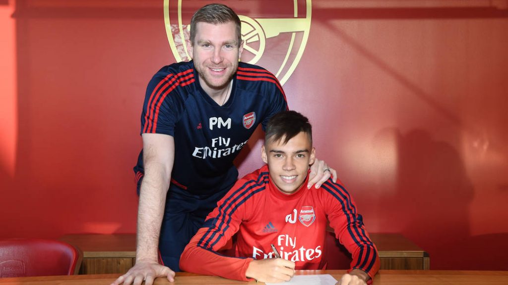 Catalin Cirjan video proves he always supported Arsenal 2 ST ALBANS, ENGLAND - DECEMBER 11: Catalin Cirjan signs his 1st Arsenal pro contract at London Colney on December 11, 2019 in St Albans, England. (Photo by Stuart MacFarlane/Arsenal FC via Getty Images)