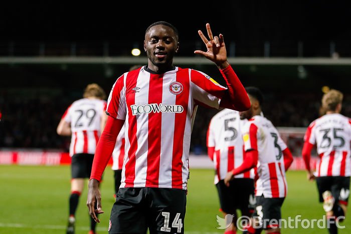 Josh Dasilva celebrating scoring a hat-trick for Brentford (Photo via Twitter)