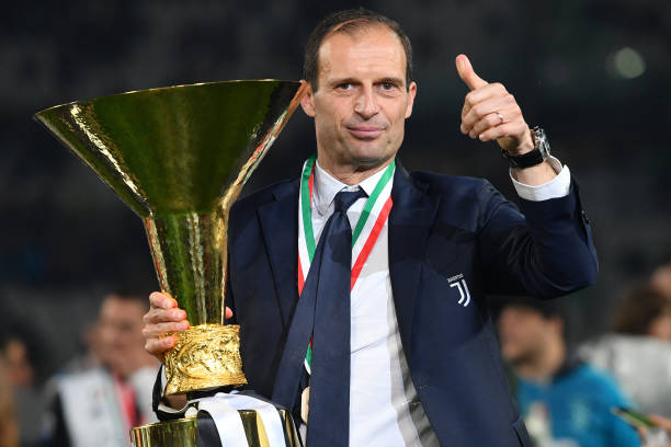 TURIN, ITALY - MAY 19: Head coach Massimiliano Allegri of Juventus celebrates during the awards ceremony after winning the Serie A Championship dur...