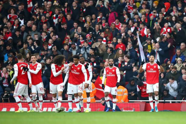 LONDON, ENGLAND - DECEMBER 29: Pierre-Emerick Aubameyang of Arsenal celebrates after scoring his sides first goal during the Premier League match b...