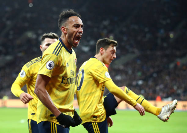 LONDON, ENGLAND - DECEMBER 09: Pierre-Emerick Aubameyang of Arsenal celebrates after he scores his sides third goal during the Premier League match between West Ham United and Arsenal FC at London Stadium on December 09, 2019 in London, United Kingdom. (Photo by Julian Finney/Getty Images)