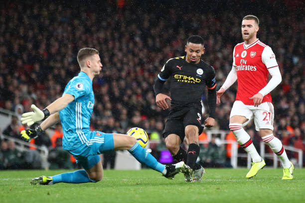 LONDON, ENGLAND - DECEMBER 15: Bernd Leno of Arsenal makes a save from Gabriel Jesus of Manchester City during the Premier League match between Ars...