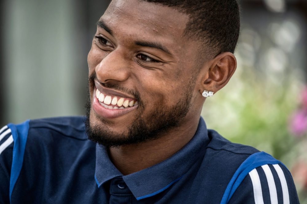 Lyon French football midfielder Jeff Reine-Adelaide answers journalists' questions, on July 1, 2020 in Evian-les-Bains, during the Olympique Lyonna...
