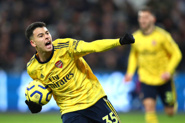 LONDON, ENGLAND - DECEMBER 09: Gabriel Martinelli of Arsenal celebrates after scoring his sides first goal during the Premier League match between ...