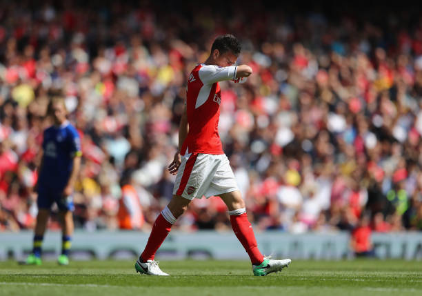 LONDON, ENGLAND - MAY 21: Laurent Koscielny of Arsenal is shown the red card during the Premier League match between Arsenal and Everton at Emirate...