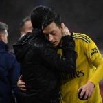 BOURNEMOUTH, ENGLAND - DECEMBER 26: Mikel Arteta, Manager of Arsenal embraces Mesut Ozil of Arsenal as he is substituted off during the Premier League match between AFC Bournemouth and Arsenal FC at Vitality Stadium on December 26, 2019 in Bournemouth, United Kingdom. (Photo by Harriet Lander/Getty Images)