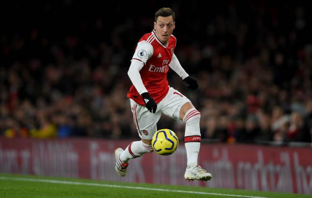 Ego, cowards & 21 other things I noticed as Arsenal messed up again 7 LONDON, ENGLAND - DECEMBER 05: Mesut Ozil of Arsenal runs with the ball during the Premier League match between Arsenal FC and Brighton & Hove Albion at Emirates Stadium on December 05, 2019 in London, United Kingdom. (Photo by Mike Hewitt/Getty Images)