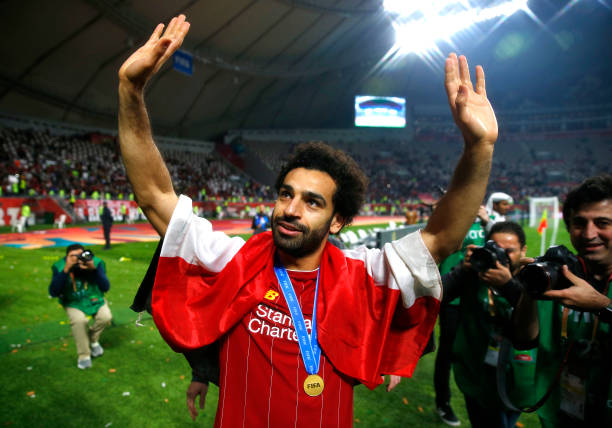 DOHA, QATAR - DECEMBER 21: Mohamed Salah of Liverpool acknowledges fans after his team's victory in the FIFA Club World Cup Qatar 2019 Final between Liverpool FC and CR Flamengo at Education City Stadium on December 21, 2019 in Doha, Qatar. (Photo by Francois Nel/Getty Images)