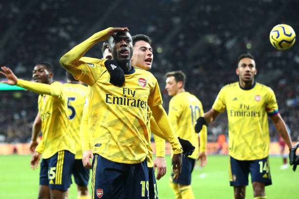 Who is fit to lineup for Arsenal vs West Ham? 4 LONDON, ENGLAND - DECEMBER 09: Nicolas Pepe of Arsenal celebrates after scoring his sides second goal during the Premier League match between West Ham United and Arsenal FC at London Stadium on December 09, 2019 in London, United Kingdom. (Photo by Julian Finney/Getty Images)