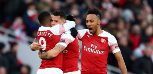 LONDON, ENGLAND - MARCH 10: Granit Xhaka of Arsenal celebrates with teammates after scoring his team's first goal during the Premier League match between Arsenal FC and Manchester United at Emirates Stadium on March 10, 2019 in London, United Kingdom. (Photo by Catherine Ivill/Getty Images)