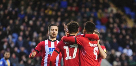 Tyreece John-Jules celebrates after Lincoln City score (Photo via Twitter)