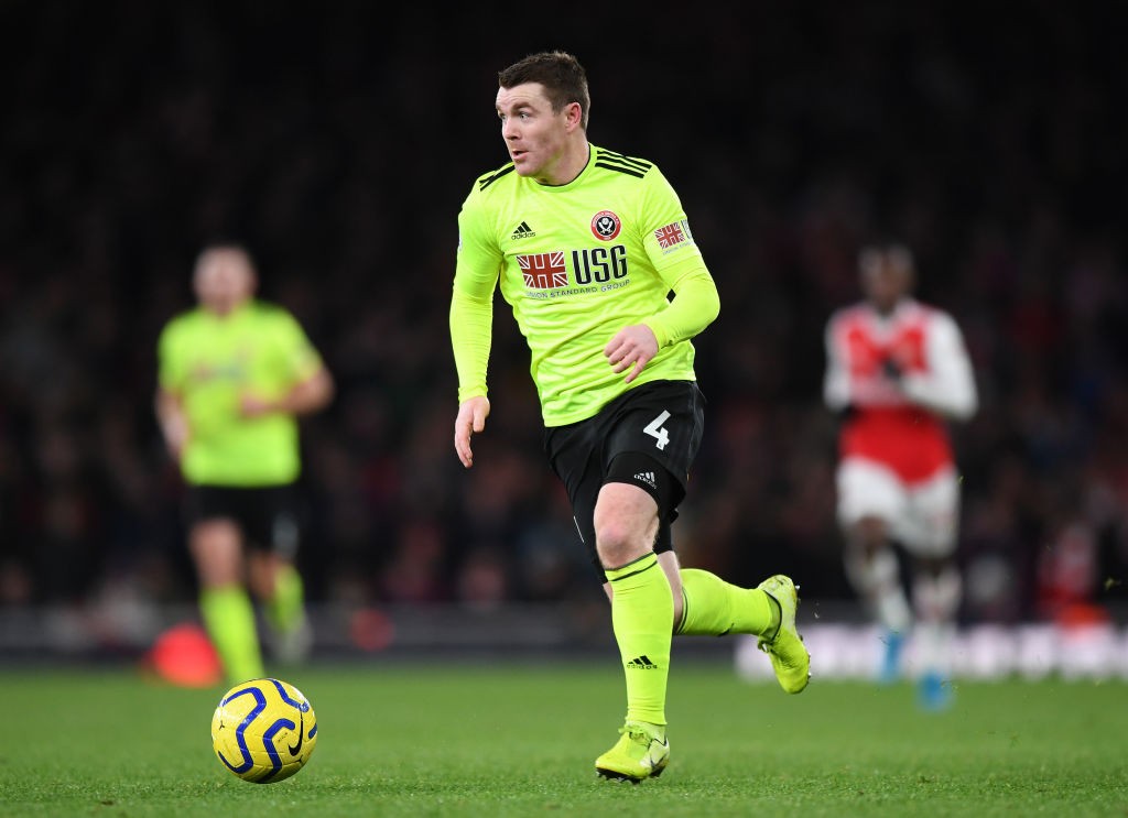 LONDON, ENGLAND - JANUARY 18: John Fleck of Sheffield United runs with the ball during the Premier League match between Arsenal FC and Sheffield Un...