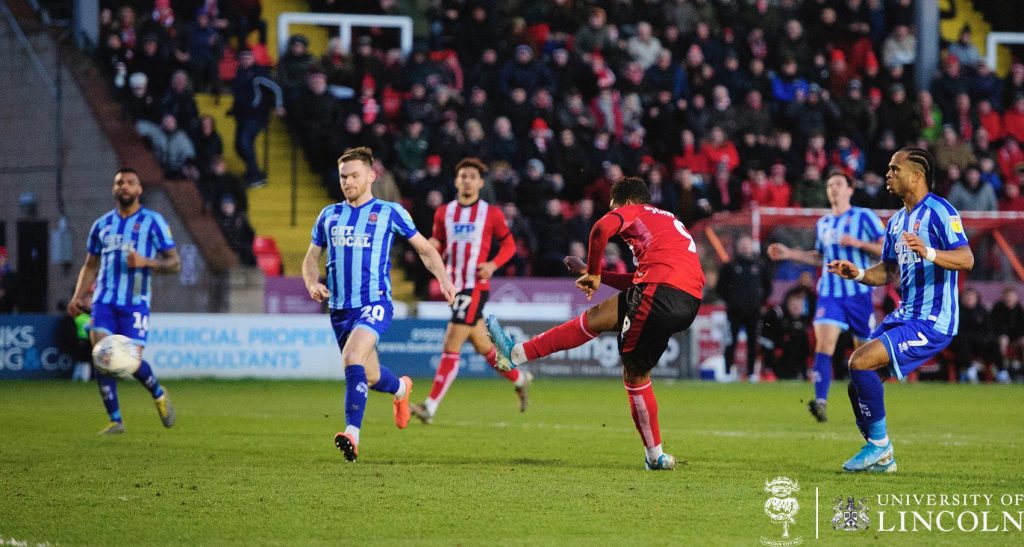 John-Jules unlikely to play again this season after injury 2 Tyreece John-Jules scoring for Lincoln City against Blackpool (Photo via Twitter)