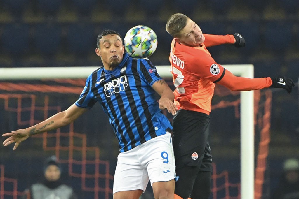 Atalanta's Colombian forward Luis Muriel and Shakhtar Donetsk's Ukrainian defender Mykola Matviyenko vie for the ball during the UEFA Champions Lea...