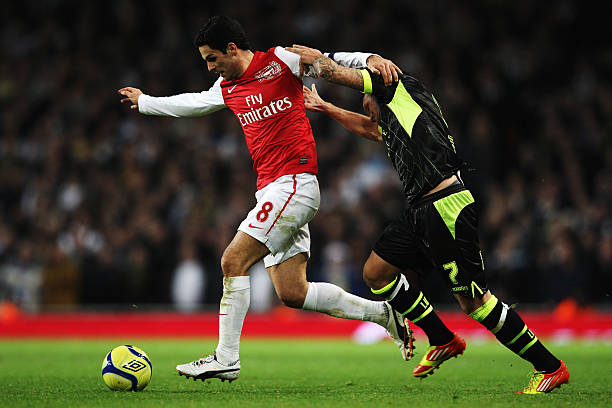 Mikel Arteta: I haven’t seen enough to make those decisions 2 LONDON, ENGLAND - JANUARY 09: Mikel Arteta (L) of Arsenal holds off the challenge of Mika Vayrynen (R) of Leeds United during the FA Cup Third Round match between Arsenal and Leeds United at the Emirates Stadium on January 9, 2012 in London, England. (Photo by Clive Mason/Getty Images)