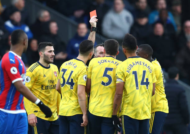 LONDON, ENGLAND - JANUARY 11: Referee Paul Tierney shows a red card to Pierre-Emerick Aubameyang of Arsenal during the Premier League match between Crystal Palace and Arsenal FC at Selhurst Park on January 11, 2020 in London, United Kingdom. (Photo by Dan Istitene/Getty Images)