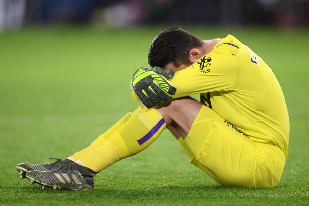 SHEFFIELD, ENGLAND - JANUARY 10: Lukasz Fabianski of West Ham United goes down injured during the Premier League match between Sheffield United and...