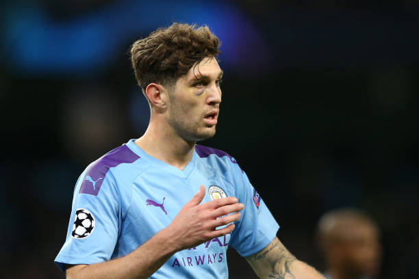 MANCHESTER, ENGLAND - OCTOBER 22: John Stones of Manchester City is seen to have a black eye as he looks on during the UEFA Champions League group ...
