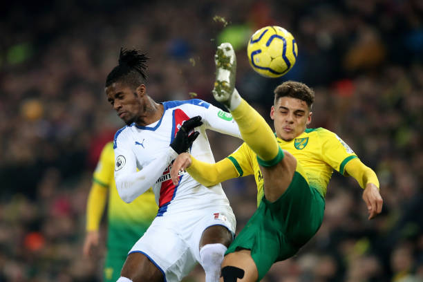 Arsenal interested in Max Aarons as Bellerin alternative 2 NORWICH, ENGLAND - JANUARY 01: Wilfried Zaha of Crystal Palace in action with Max Aarons of Norwich City during the Premier League match between Norwich City and Crystal Palace at Carrow Road on January 1, 2020 in Norwich, United Kingdom. (Photo by Marc Atkins/Getty Images)