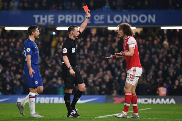 Stuart Atwell Arsenal's worst referee in Premier League 2 Referee Stuart Atwell (C) shows a red card to Arsenal's Brazilian defender David Luiz (R) to send him off for fouling Chelsea's English striker Tammy Abraham during the English Premier League football match between Chelsea and Arsenal at Stamford Bridge in London on January 21, 2020. (Photo by DANIEL LEAL-OLIVAS / AFP) / RESTRICTED TO EDITORIAL USE. No use with unauthorized audio, video, data, fixture lists, club/league logos or 'live' services. Online in-match use limited to 120 images. An additional 40 images may be used in extra time. No video emulation. Social media in-match use limited to 120 images. An additional 40 images may be used in extra time. No use in betting publications, games or single club/league/player publications. / (Photo by DANIEL LEAL-OLIVAS/AFP via Getty Images)