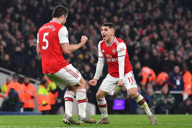 Stats show Lucas Torreira instant improvement under Mikel Arteta compared to Unai Emery 3 Arsenal's Greek defender Sokratis Papastathopoulos (L) celebrates with Arsenal's Uruguayan midfielder Lucas Torreira (R) after scoring their second goal during the English Premier League football match between Arsenal and Manchester United at the Emirates Stadium in London on January 1, 2020. (Photo by Ben STANSALL / AFP)