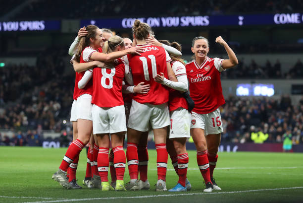 Katie McCabe of Arsenal celebrates with the team after Vivianne Miedema of Arsenal scores her sides second goal during the Barclays FA Women's Super League match between Tottenham Hotspur and Arsenal at Tottenham Hotspur Stadium on November 17, 2019 in London, United Kingdom.
