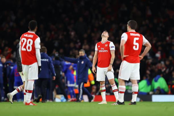 Granit Xhaka of Arsenal FC looks on dejected after his side concede their second goal during the UEFA Europa League round of 32 second leg match be...