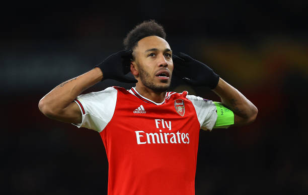 Pierre-Emerick Aubameyang of Arsenal FC celebrates after scoring his team's first goal in extra-time during the UEFA Europa League round of 32 seco...