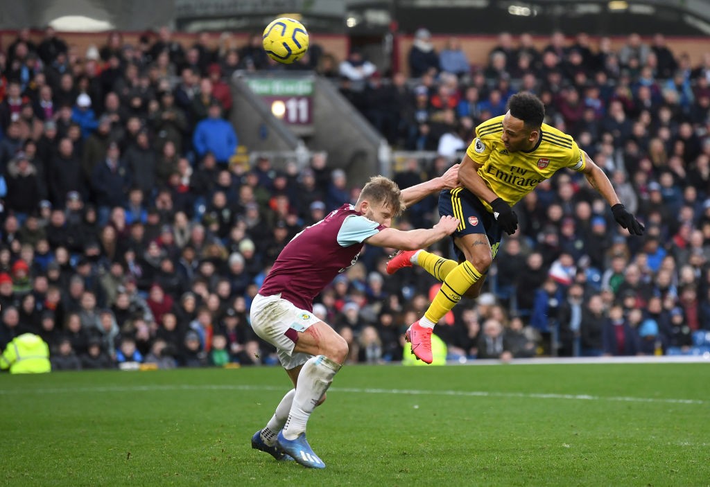 Arsenal Player Ratings vs Burnley 6 BURNLEY, ENGLAND - FEBRUARY 02: Pierre-Emerick Aubameyang of Arsenal wins a header under pressure from Charlie Taylor of Burnley during the Premier League match between Burnley FC and Arsenal FC at Turf Moor on February 02, 2020, in Burnley, United Kingdom. (Photo by Gareth Copley/Getty Images)