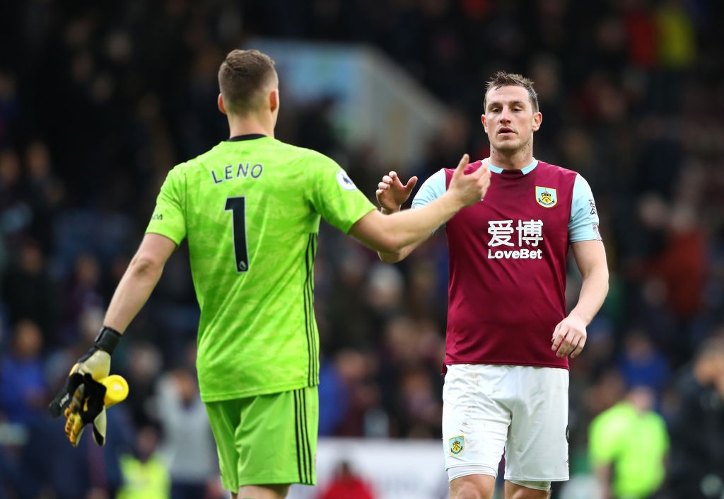 BURNLEY, ENGLAND - FEBRUARY 02: Bernd Leno of Arsenal shakes hands with Chris Wood of Burnley after the Premier League match between Burnley FC and...