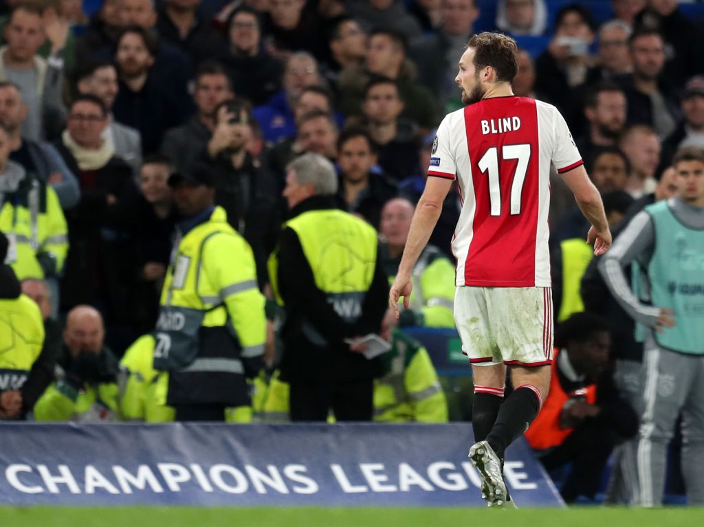 LONDON, ENGLAND - NOVEMBER 05: Daley Blind of AFC Ajax leaves the pitch after receiving a red card during the UEFA Champions League group H match b...