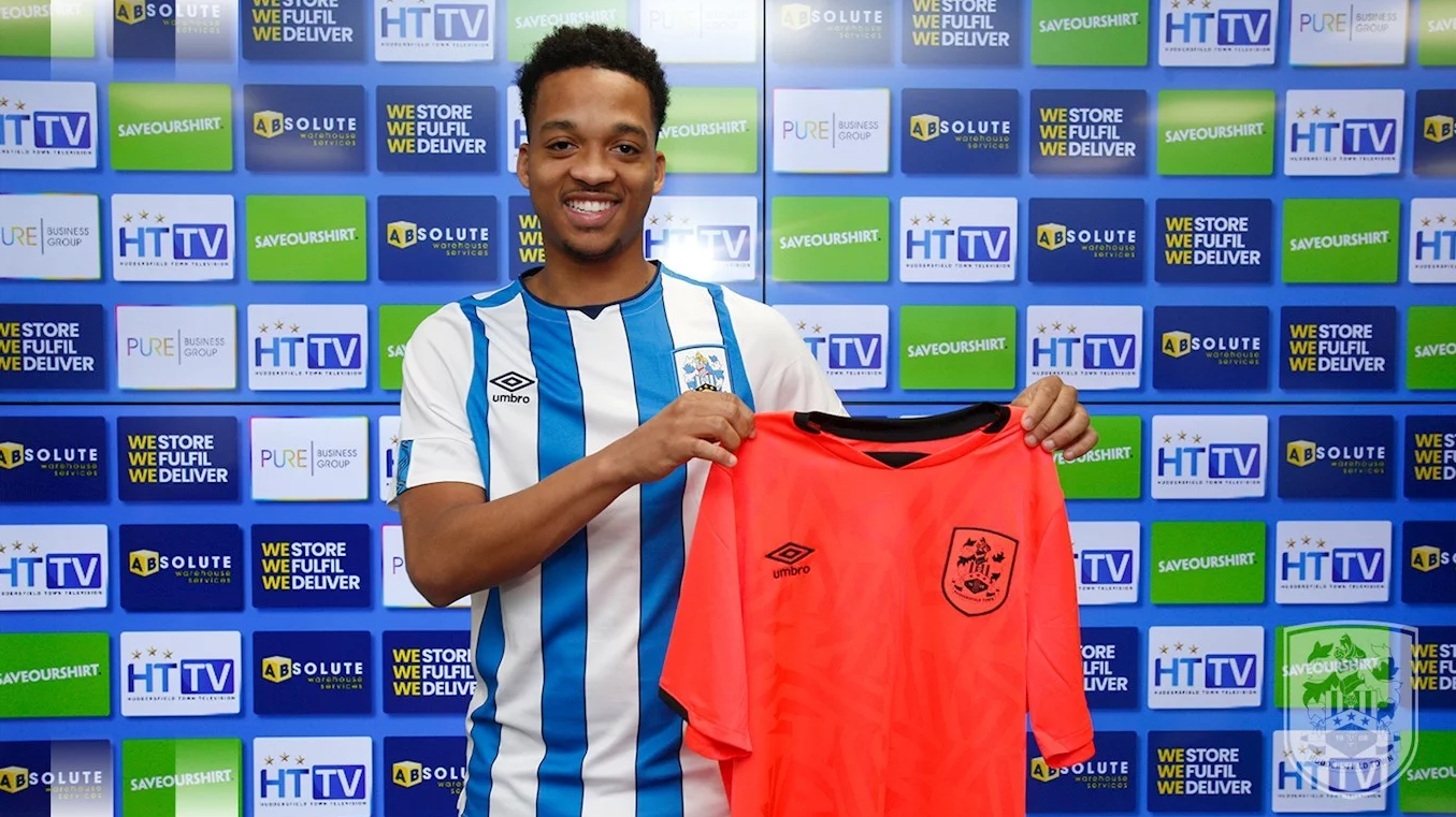 Chris Willock with Huddersfield Town (Photo via HTAFC.com)