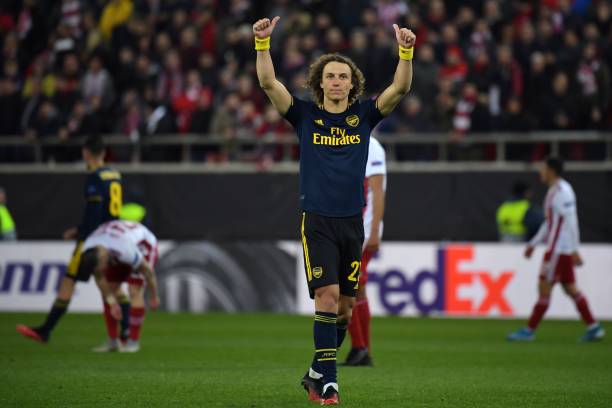 Arsenal's Brazilian defender David Luiz celebrates their win on the pitch after the UEFA Europa League round of 32 first leg football match between Olympiakos and Arsenal at the Karaiskakis Stadium in Piraeus, near Athens, on February 20, 2020. - Arsenal won the game 1-0.