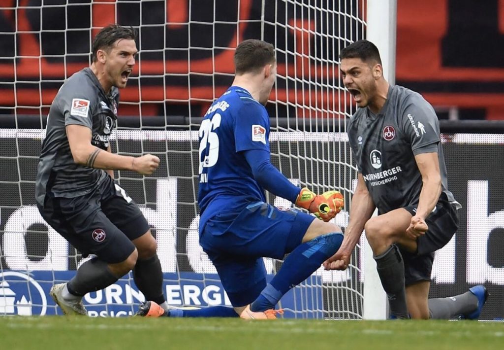 Mavropanos holds Stuttgart medical as loan edges closer 2 Mavropanos celebrates with his FC Nürnberg teammates (Photo via Twitter / DMavropanos)